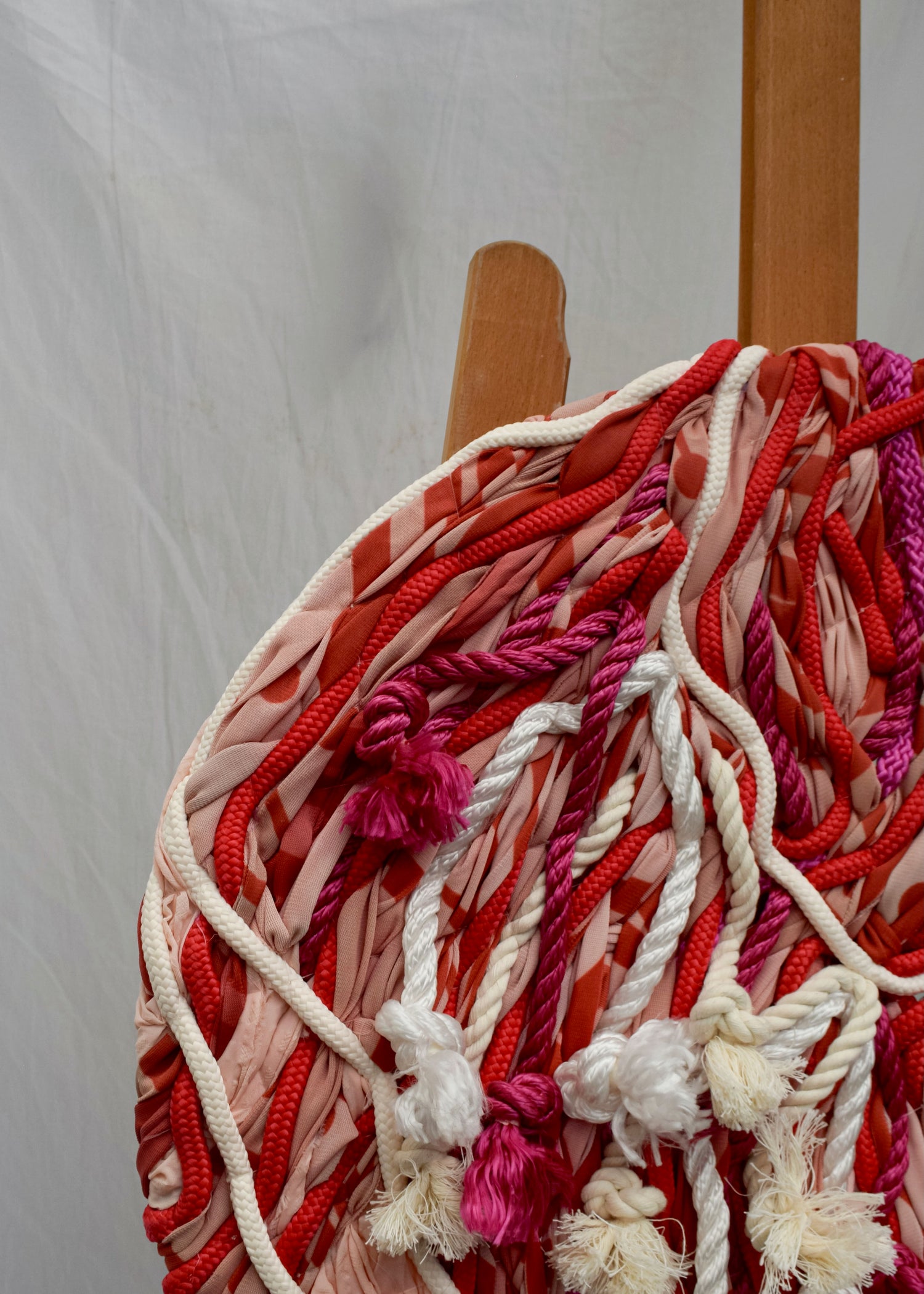 Contemporary oversized red botanical embroidery tapestry close up detail