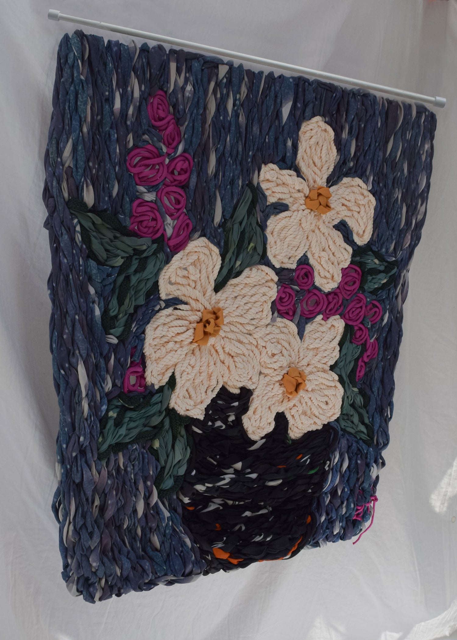Oversized hand embroidery of a floral vase arrangement, hanging tapestry