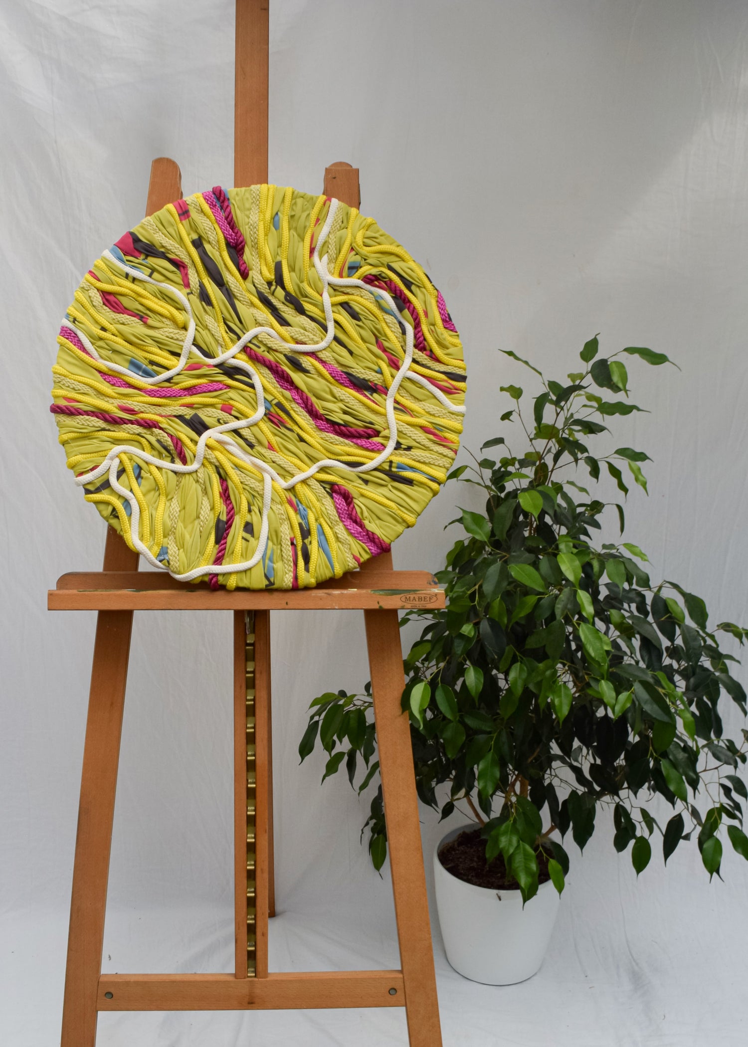 Oversized yellow floral embroidery tapestry with abstract botanical forms
